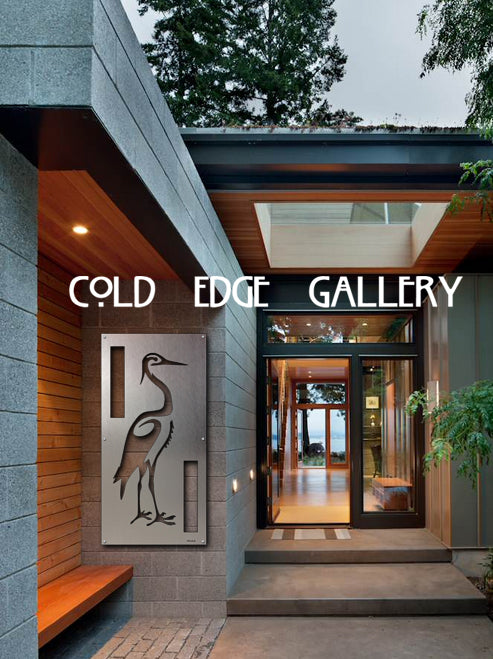 Modern entrance featuring large metallic crane artwork, labeled "Cold Edge Gallery," with glass doors, wooden accents, and greenery visible in the background.