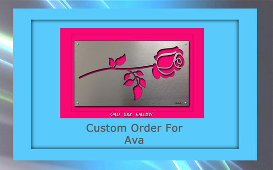 A custom rectangular metal artwork featuring a rose design against a bright pink background. Text below reads "Custom Order For Ava" with "Cold Edge Gallery" at the top of the pink area.