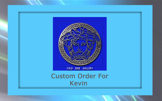 A blue framed graphic depicting a custom order for Kevin from Cold Edge Gallery, featuring a metal medallion design with a Greek-inspired face.