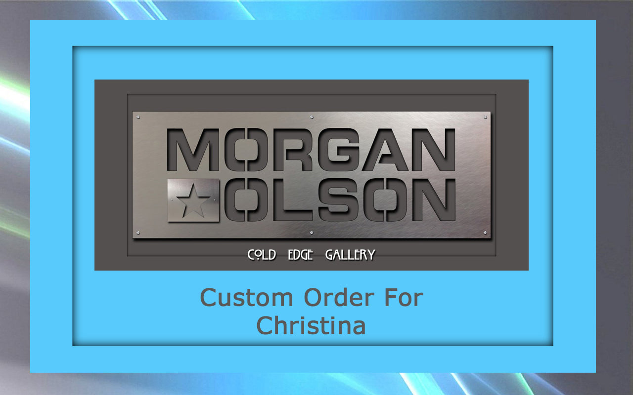 A framed sign with "MORGAN OLSON" in bold letters and "Cold Edge Gallery" underneath, labeled "Custom Metal Artwork Order For Christina" on a blue-gray background.