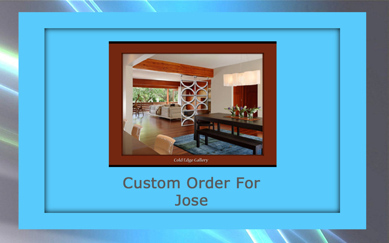 Framed picture of a modern dining room with caption "Custom Order For Jose." The room features a dining table, large windows, and decorative wall panels. The frame is light blue and brown, highlighting the custom artwork and adding an elegant touch to the space.