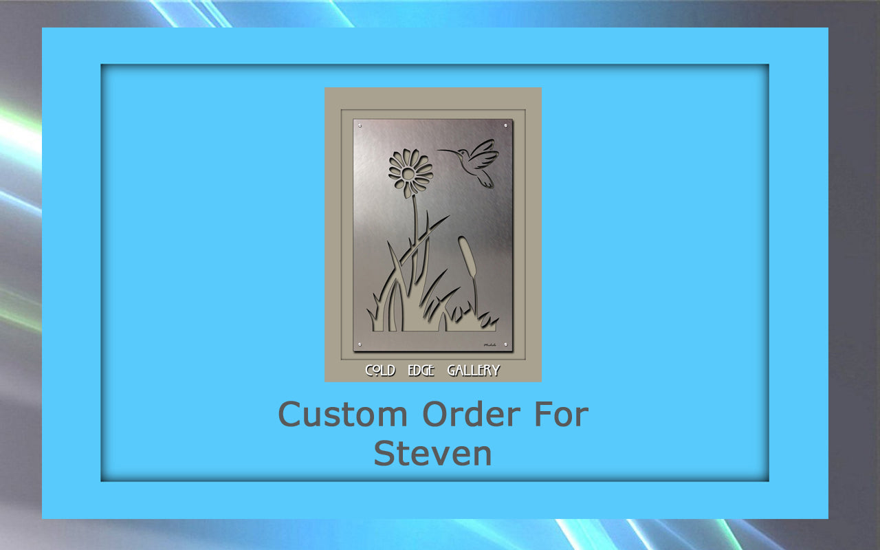 A custom metal wall panel featuring an intricate floral and bird design is displayed. The text "Custom Order For Steven" appears beneath the stunning artwork, which is bordered by a blue frame.