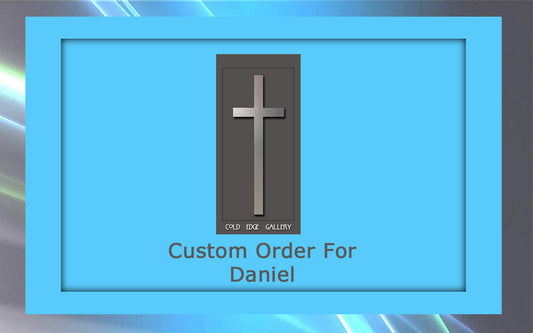 A design mockup from Cold Edge Gallery featuring a custom artwork for Daniel, showcasing a cross symbol on a rectangular background with a blue border, meticulously crafted to meet his specifications.