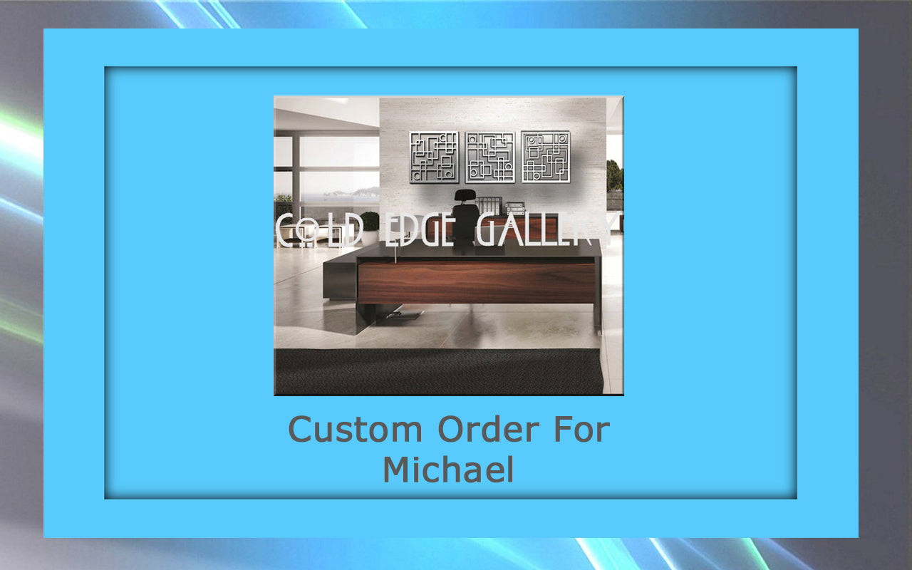 An office setting with a modern wooden desk and a chair behind it. The words "COLD EGE GALLERY" and "Custom Order For Michael" are displayed over the image, highlighting a custom piece of metal artwork.