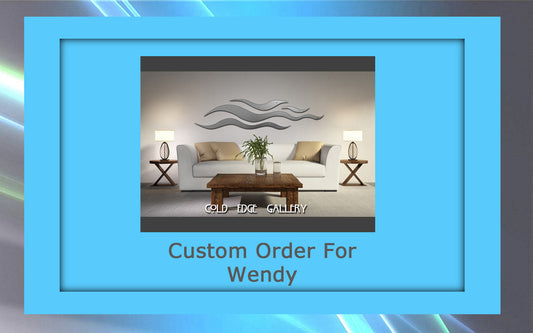 A framed image showcasing a custom living room with two white sofas, a wooden coffee table, abstract wall art, and the text "Custom Order For Wendy" from Cold Edge Gallery.