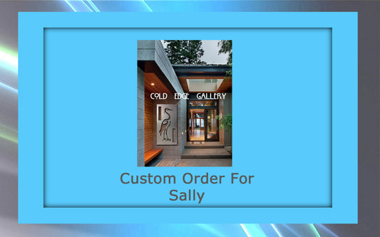 A modern gallery entrance with "Cold Edge Gallery" signage, framed in blue, proudly displays the text "Custom Metal Artwork Order For Sally" below.