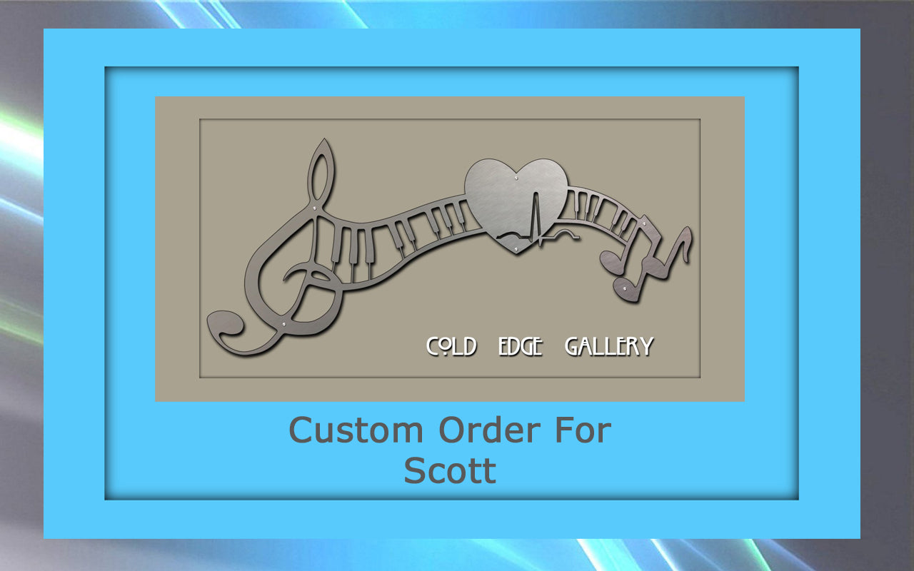 A metallic music-themed wall art with treble clef, heart, and notes displayed in a blue frame. Text reads "COLD EDGE GALLERY" and "Custom Order For Scott.