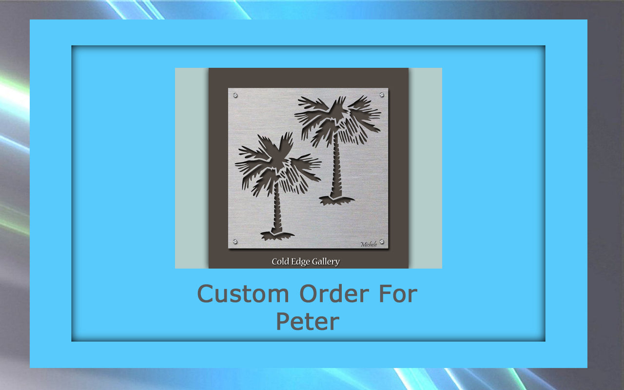 Metal frame with laser-cut palm trees from Cold Edge Gallery, labeled "Custom Order For Peter." This custom artwork is elegantly framed in a blue border.