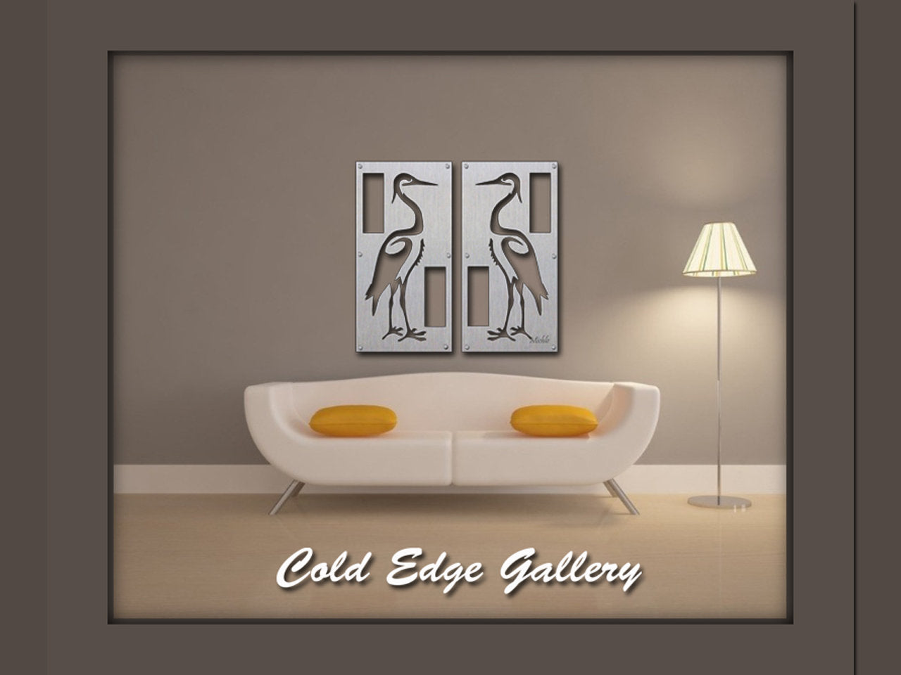 A contemporary living room featuring a gray sofa, white armchairs, and a coffee table. Two framed artworks depicting herons and labeled "Cold Edge Gallery" are displayed on the wall.