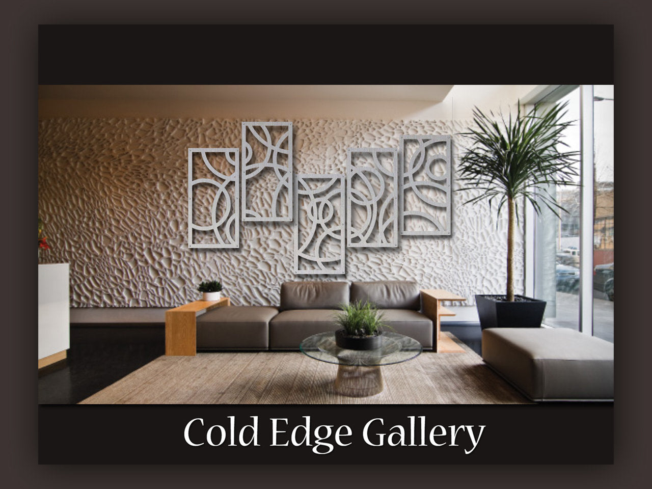 Modern living room with white textured wall art, grey sofa, wooden and grey coffee tables with a potted plant, and large windows with two tall plants. Text below reads "Cold Edge Gallery.