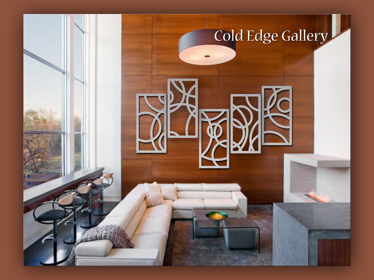 Modern living room with a white sectional sofa, abstract wall art, bar stools, and large windows. "Cold Edge Gallery" text appears in the upper right corner.