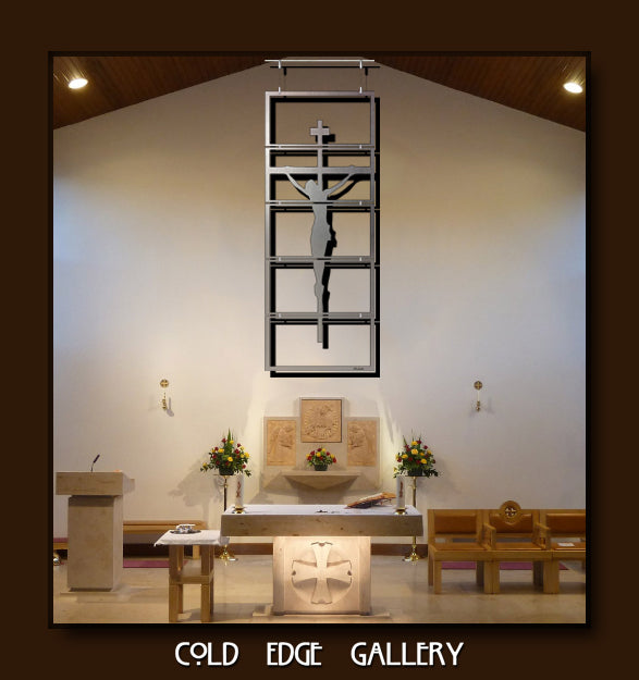 Interior of a modern church with a cross and crucifixion sculpture above the altar, surrounded by floral arrangements and liturgical furniture. The image has the text "COLD EDGE GALLERY" at the bottom.