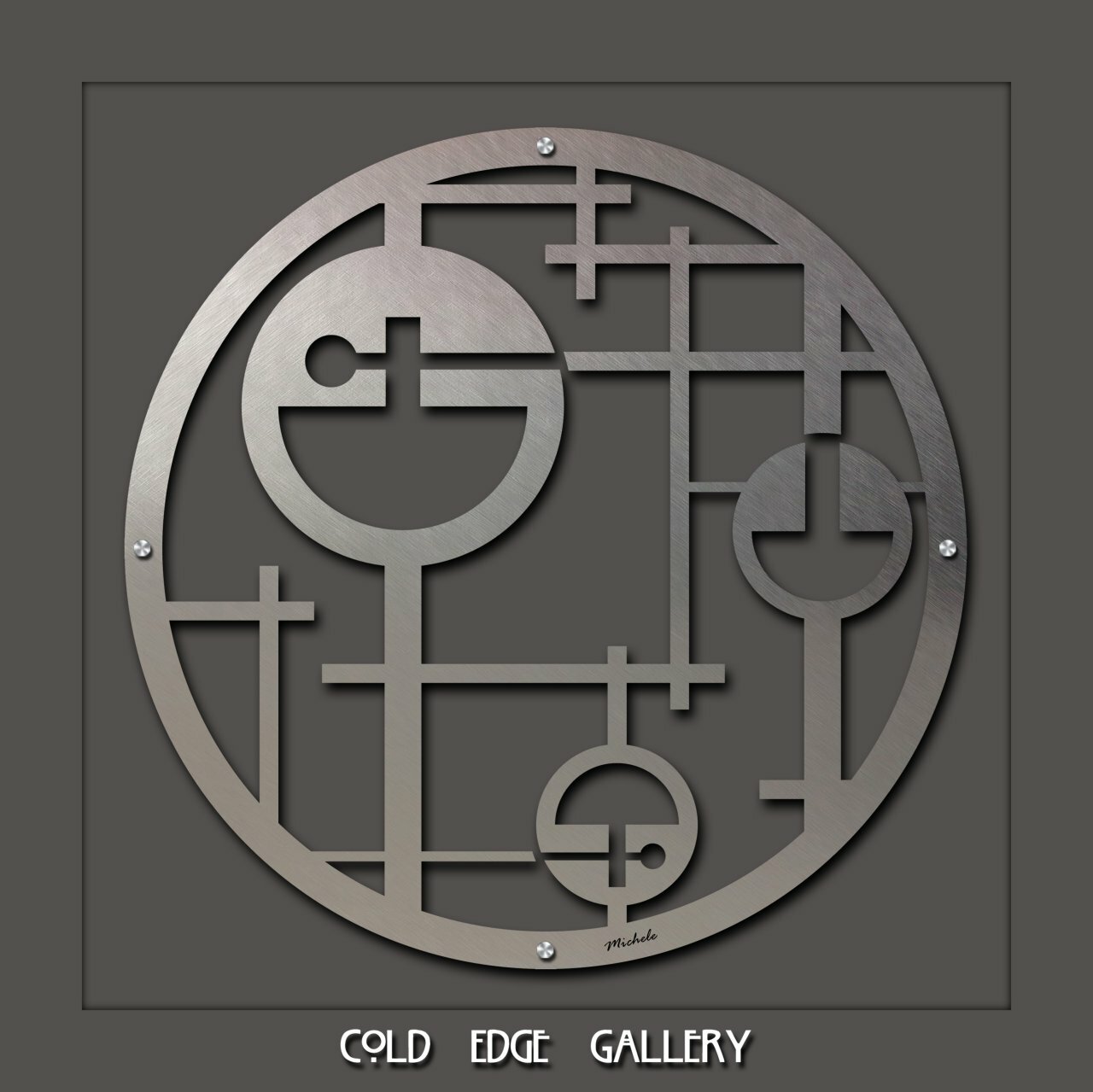 A metallic wall sculpture featuring geometric shapes and circles at the Cold Edge Gallery.