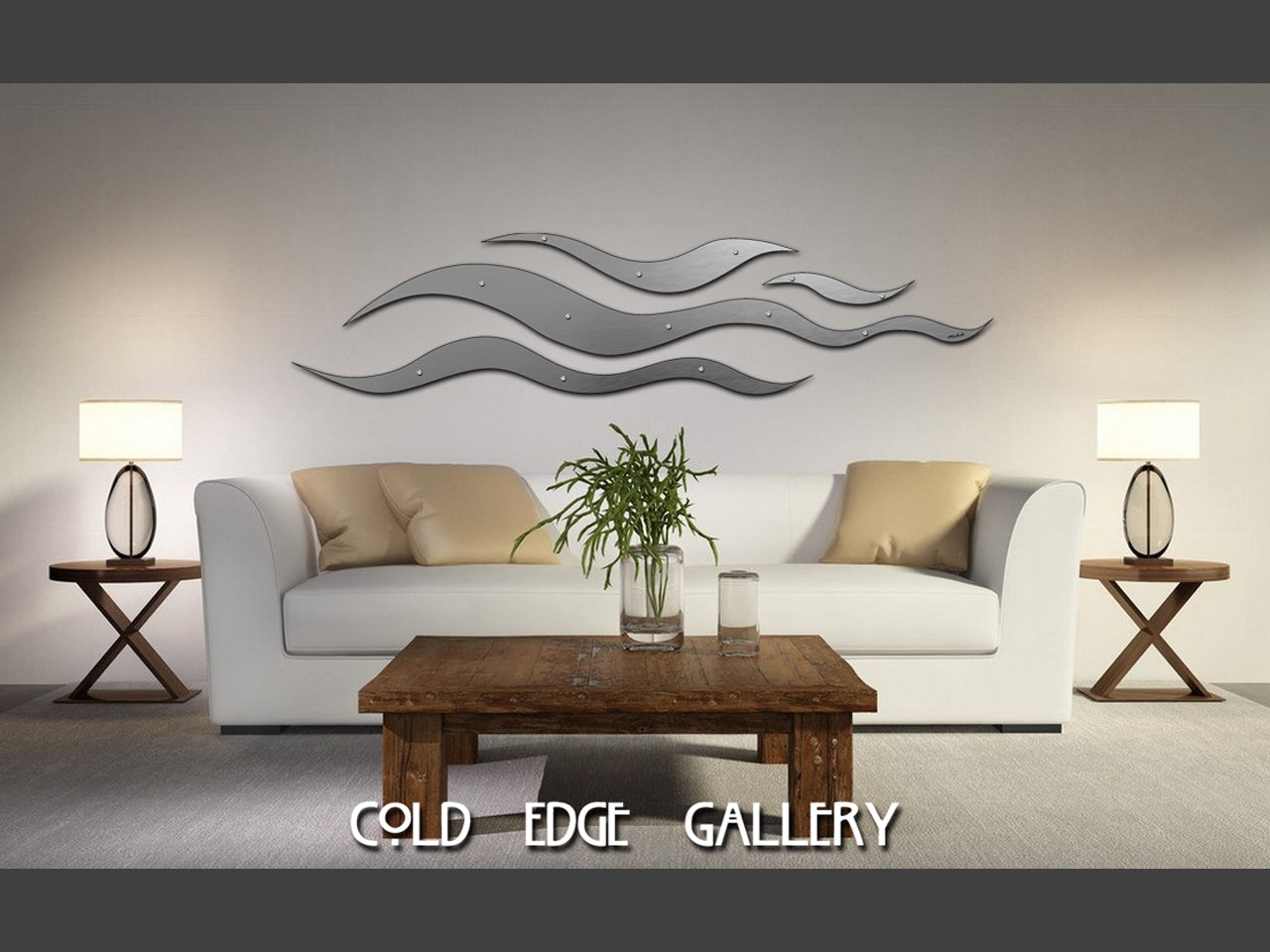 A minimalist living room featuring a white sofa, wooden coffee table, two side tables with lamps, and wave-like wall art. Text at the bottom reads "COLD EDGE GALLERY.